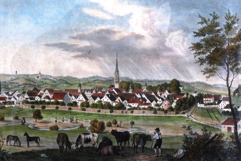 Diese Darstellung von Pfaffenhofens zeigt eine kolorierte Zeichnung der Stadt um das Jahr 1830 von Osten mit dem Stadtgraben und dem Hungerturm sowie der Ilm im Vordergrund und den nahe an die Stadt heranreichenden Wiesen. Quelle: Stadtarchiv, Sauer